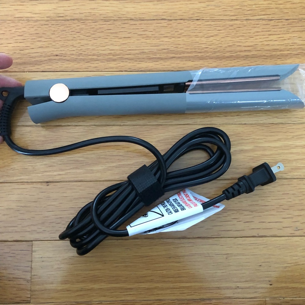 Brand new, never used Complex Culture titanium styling flat iron